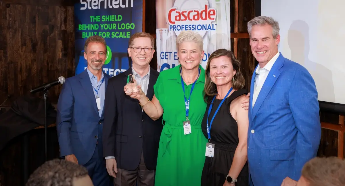 Group photo of ESFA winners with Doug Sutton, Steritech President